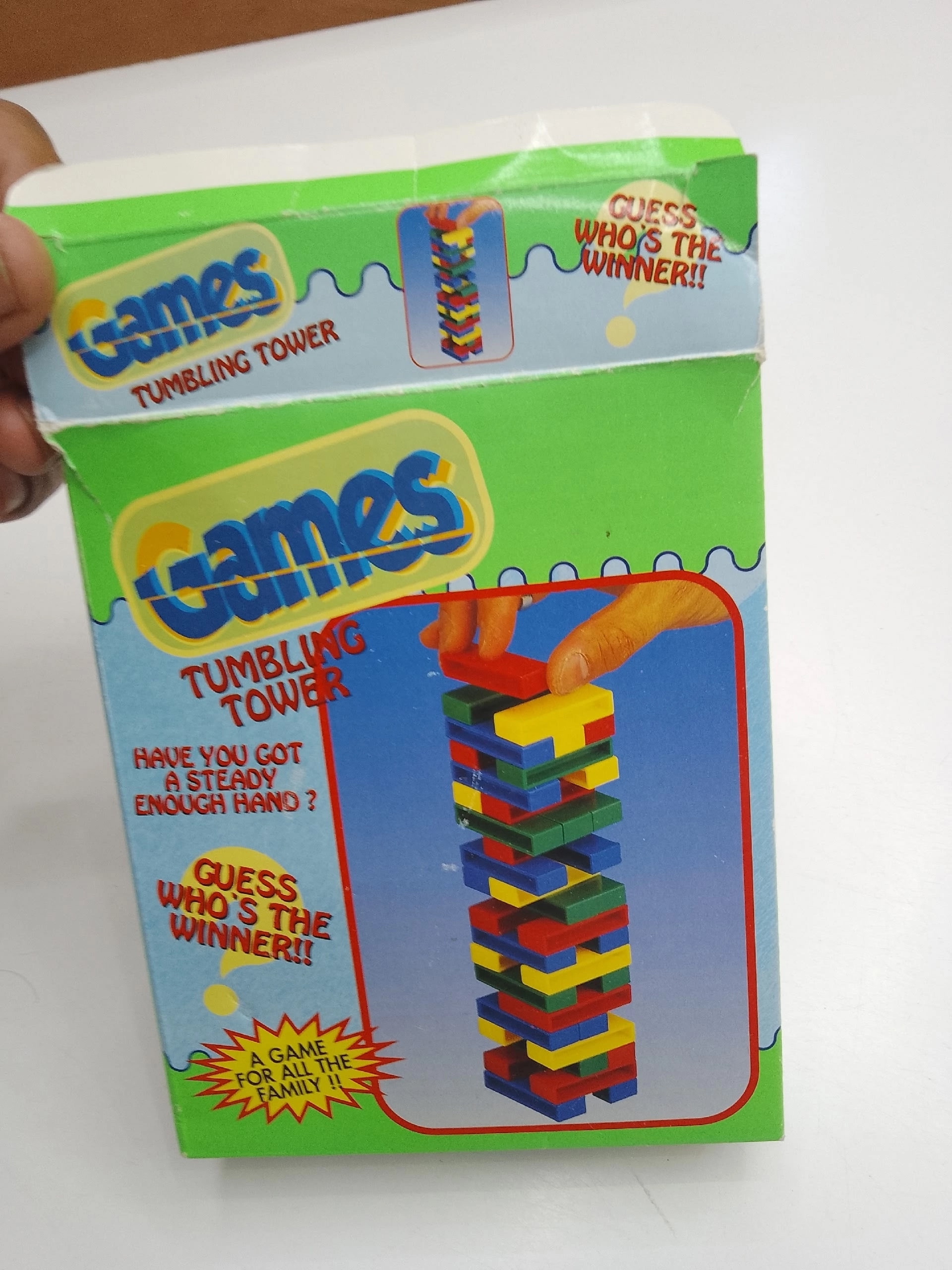 Зеленая коробка настольной игры Tumbling Tower