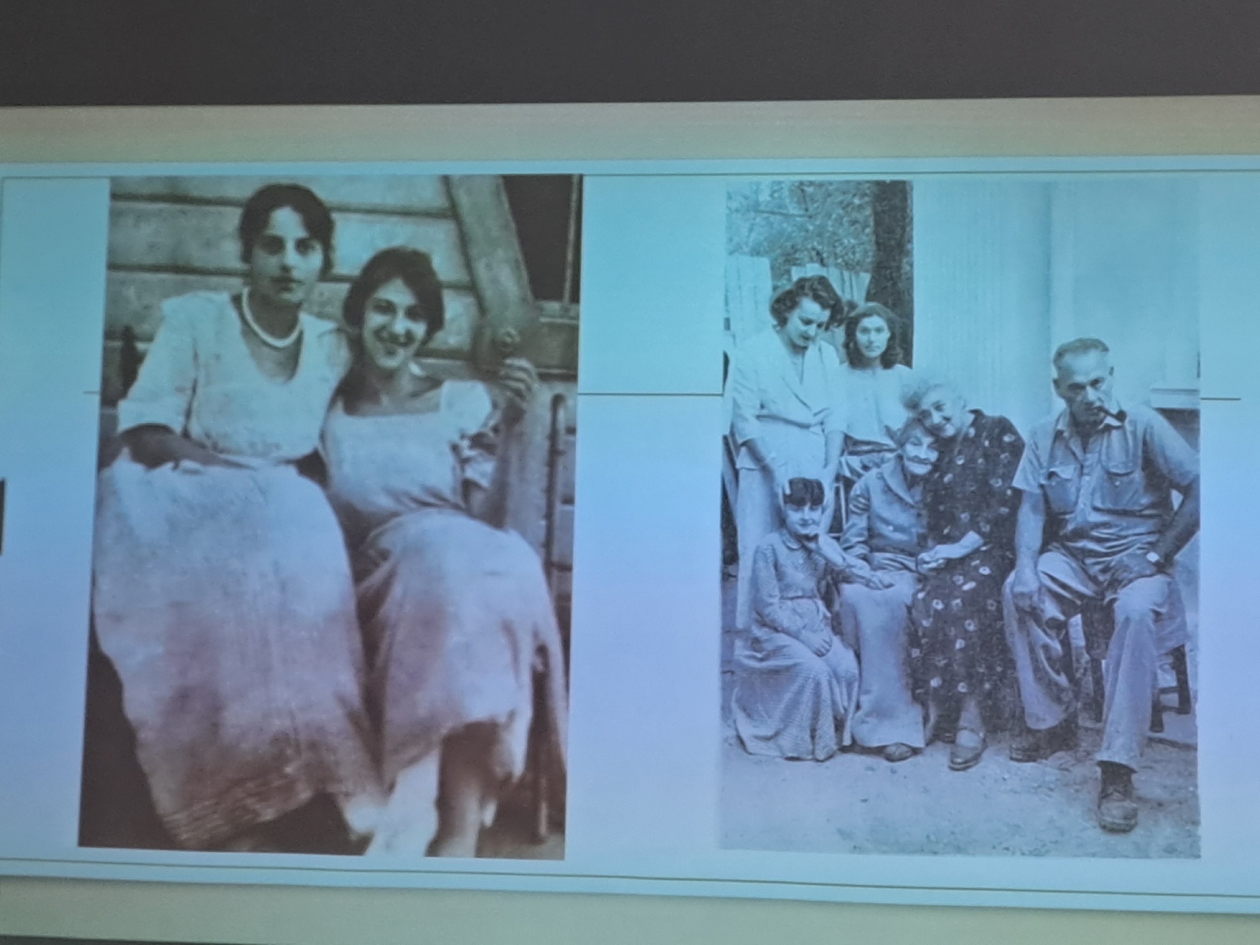 Экран с историческими черно-белыми фотографиями на презентации